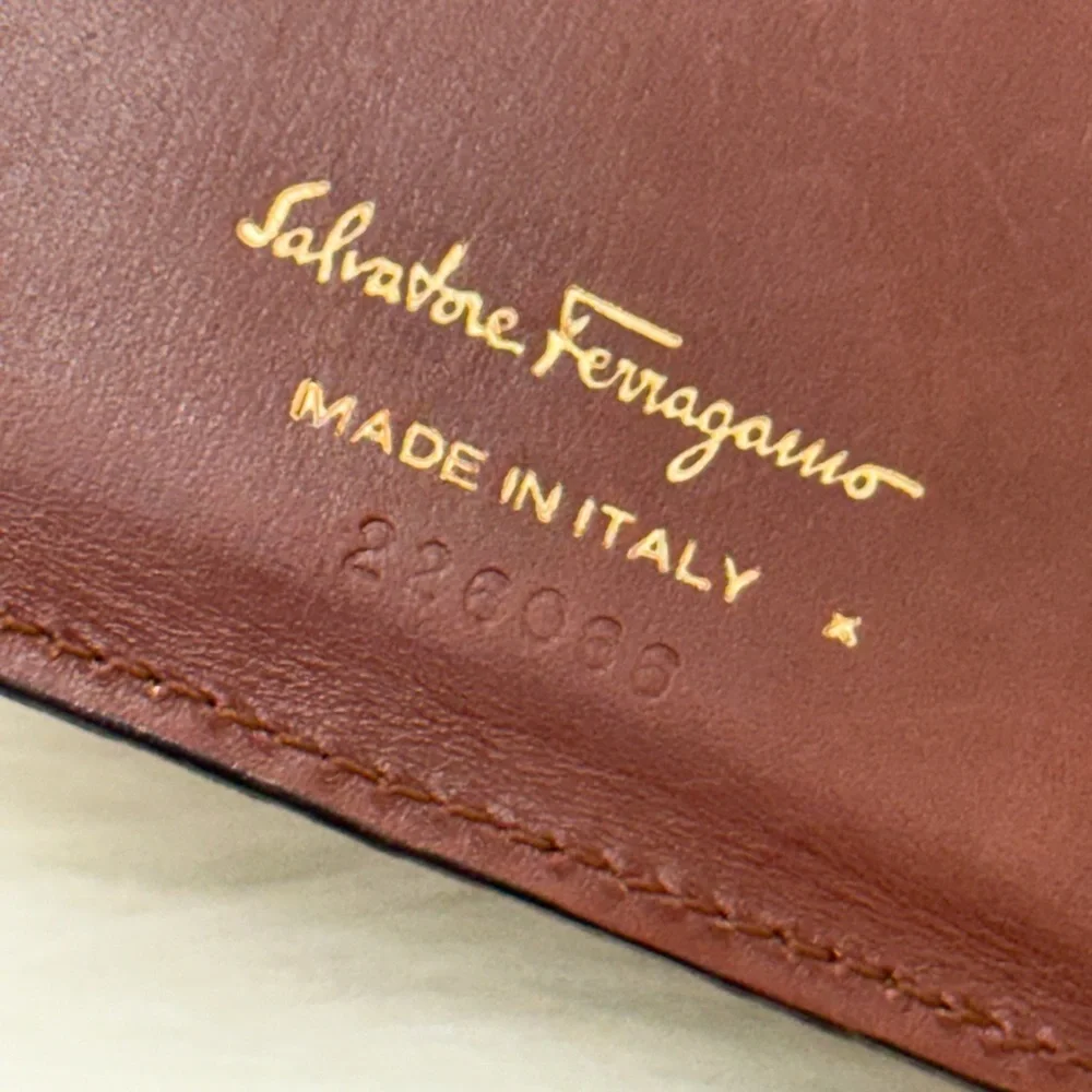 SALVATORE FERRAGAMO - BROWN WOVEN LEATHER BI-FOLD WALLET